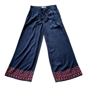 Navy Blue Wide-Leg Pants with Red Embroidery, Zip Closure & Tie Waist. Pockets